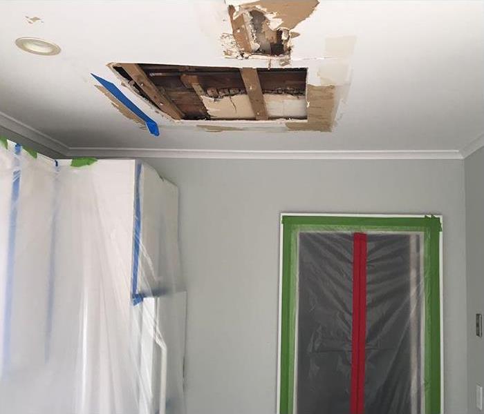 ceiling damages from storm damaged roof water leak